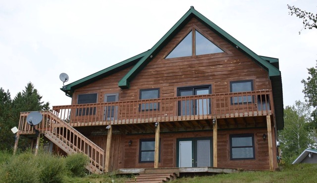 Spacious lakefront 3 bed 3 bath cabin with spectacular views and great fishing.