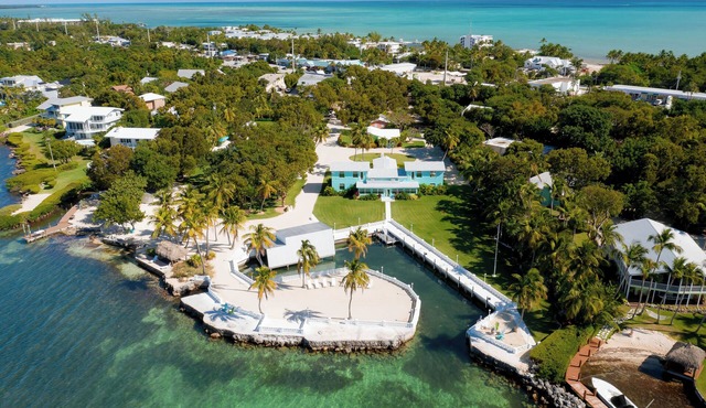 Sprawling Bayfront Estate in Heart of Islamorada with Deep Dockage, Heated Pool, Kayaks and More!