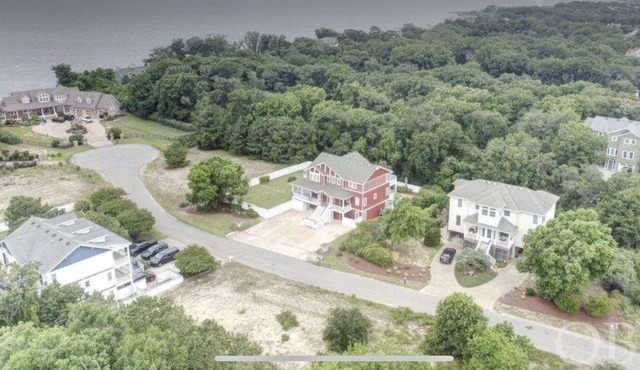Stunning 7 BR Home steps from Duck Village with Pool and Elevator
