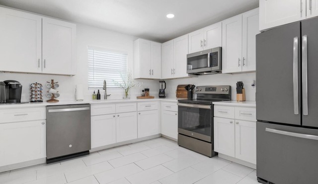 "Stunning Home w/Heated Pool & Fenced Yard"