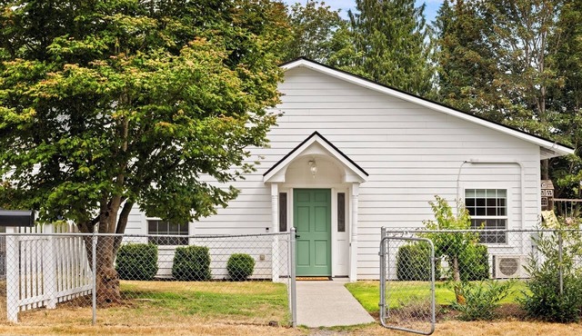 This cottage offers a spacious layout ideal for relaxing or working remotely.
