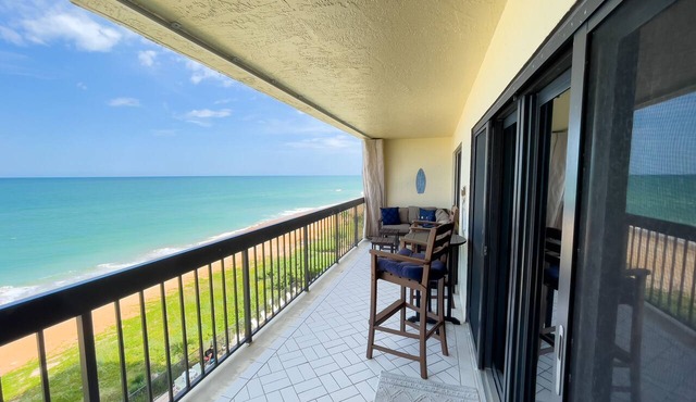 Updated direct oceanfront corner condo with private balcony, heated pool and garage