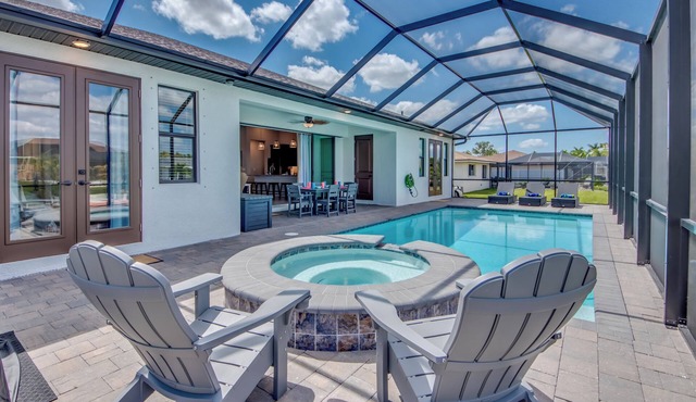 Villa Shore Thing - Exceptional 4 BR Villa with 2 master suites, heated pool, kayaks, pool table, bikes, fishing poles