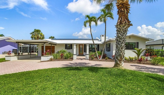 Waterfront Beach-Style Retreat with Pool, Dock & Game Room in Fort Myers