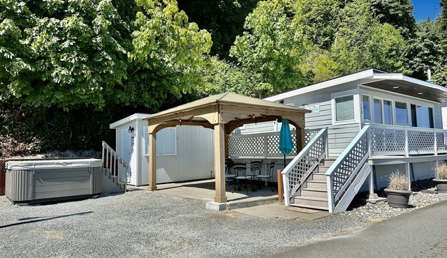 Waterfront Cabin on Camano Island with hot tub and outdoor patio.