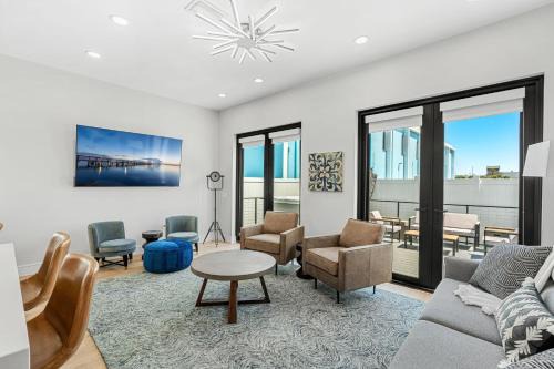 Wave Haven Villas - 2 Luxury Villas - 3BR 3 and a Half BA Each - Sleeps 8 Per Unit - Hot Tub - Across from Beach - Rocket and Beach Views
