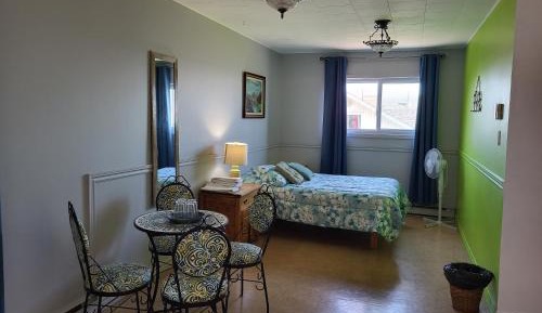 Quadruple Room with Shared Bathroom