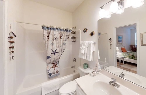 Carolina Yacht Landing Condo | Lakefront condo with pool, hot tub, close to beach