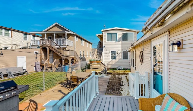 Charming single-level escape with shared patio, grill, full kitchen, & AC